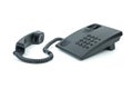 Black office phone with handset near Royalty Free Stock Photo