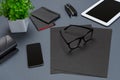 Black office stuff collection flat lay. Top view on set of stationery with smartphone and tablet Royalty Free Stock Photo