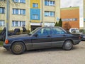 Black old sedan car Mercedes Benz 190 parked