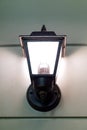 Black old style street lantern on the wall Royalty Free Stock Photo