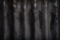 The black old zinc corrugated steel sheet has rust Royalty Free Stock Photo