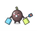 Black olive mascot cartoon holding a shopping bag