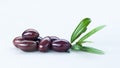 Black Olives with Green Leaves Composition Isolated On White Background Royalty Free Stock Photo