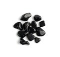 Black onyx pebbles isolated, polished hematite gem stones