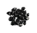 Black onyx pebbles isolated, polished hematite gem stones