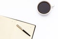 Black open diary, pen and Cup of black coffee on a white background. Royalty Free Stock Photo