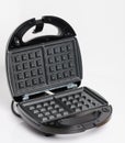 Black open waffle maker machine Royalty Free Stock Photo
