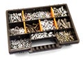 Black and orange box organizer for the screws, dowels, self-tapping screws and washers