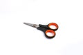 Black Orange used scissors isolated on white background Royalty Free Stock Photo