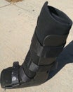 A black Orthopedic or medical boot, cast or footwear Royalty Free Stock Photo