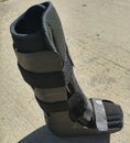A black Orthopedic or medical boot, cast or footwear Royalty Free Stock Photo