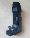 A black Orthopedic or medical boot, cast or footwear Royalty Free Stock Photo