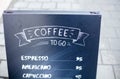 Black outdoor sign coffee to go on the street, menu