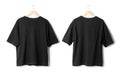 Black oversize T shirt mockup hanging isolated on white background with clipping path. Royalty Free Stock Photo