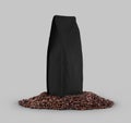 Black packaging mockup on coffee beans, isolated on background Royalty Free Stock Photo