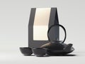 Black packaging paper bag with black teapot. 3d rendering