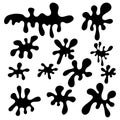 Black paint blots collection of vector icons. Cartoon paint splatters and ink splashes. Royalty Free Stock Photo