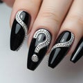 Black-painted fingernails featuring an artistic design with silver question mark symbols outlined Royalty Free Stock Photo