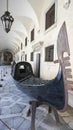 Black painted Gondola exhibited in Doges palace Venice Italy Royalty Free Stock Photo