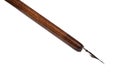 Black painted nib in brown dip pen close up Royalty Free Stock Photo