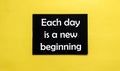 Black pancel write a text Each day is a new beginning on the yellow Royalty Free Stock Photo