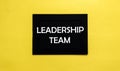 Black pancel write a text leadership team on the yellow Royalty Free Stock Photo
