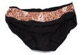 A black pantie with brown spots prints