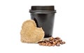 Black paper coffee cup with burlap heart and coffee beans on white Royalty Free Stock Photo