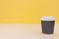 Black paper cups for packing hot coffee at coffee shops sent to customers according to orders that customers want to drink at the