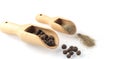 Black papper in spoon on the wooden cutting board on the white background,copy space Royalty Free Stock Photo