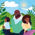 black parents couple with son in the landscape