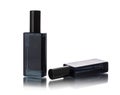 Black parfum bottle isolated on white Royalty Free Stock Photo