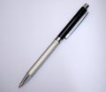 Black parker pen on a white paper