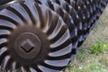 Black part of agricultural disk harrow. Concept of modern technology in agriculture Royalty Free Stock Photo