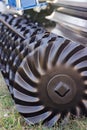 Black part of agricultural disk harrow. Concept of modern technology in agriculture Royalty Free Stock Photo