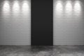 Black part of white brick wall with concrete floor in empty room Royalty Free Stock Photo