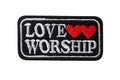 Black patch with LOVE WORSHIP lettering and two red hearts embroidery