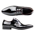 Black patent leather men shoes against white