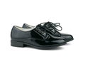 Black patent leather shoes with tied laces izolirovannye on a white background. Royalty Free Stock Photo
