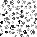 Black Paw print icon isolated seamless pattern on white background. Dog or cat paw print. Animal track. Vector Royalty Free Stock Photo