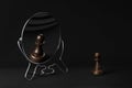 Black pawn admiring himself Royalty Free Stock Photo