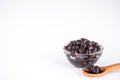 Black pearls. Boiled tapioca pearls for bubble tea on white background. Royalty Free Stock Photo