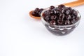 Black pearls. Boiled tapioca pearls for bubble tea on white background. Royalty Free Stock Photo