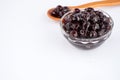 Black pearls. Boiled tapioca pearls for bubble tea on white background. Royalty Free Stock Photo