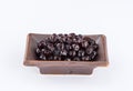 Black pearls. Boiled tapioca pearls for bubble tea on white background. Royalty Free Stock Photo