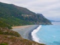 Black pebble beach of Nonza, Corsica, France. Royalty Free Stock Photo