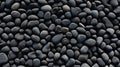 Black pebble stones texture background, Top view, Close up