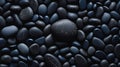 Black pebbles background.