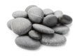 Black pebbles on white background Royalty Free Stock Photo