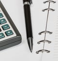 Black pen and calculator, notebook Royalty Free Stock Photo